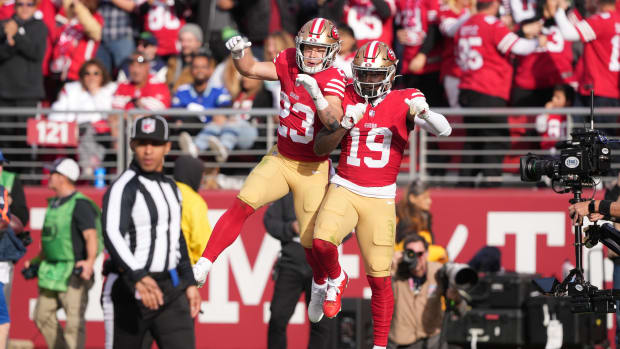 Dec 10, 2023; Santa Clara, California, USA; San Francisco 49ers wide receiver Deebo Samuel (19) celebrates with running back Christian McCaffrey (23) after scoring a touchdown against the Seattle Seahawks during the second quarter at Levi's Stadium. Mandatory Credit: Darren Yamashita-USA TODAY Sports
